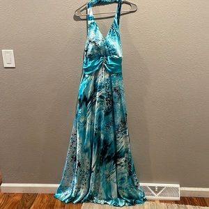 Long satinny dress. B. Smart size 18